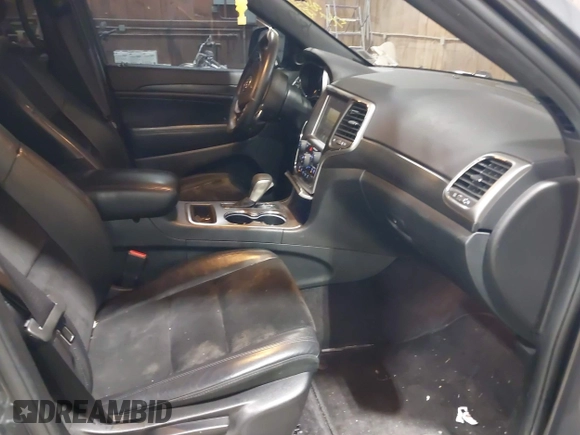 2017 Jeep Grand Cherokee Laredo with VIN 1C4RJFAG8HC910038, listed as a IAAI auction lot 41928179 with 76,862 mi miles. Bid and sale history available at carsss.com. Image 5.