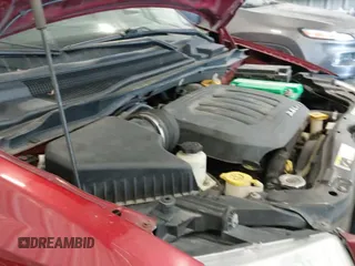 2014 Dodge Grand Caravan SE 30th Anniversary with VIN 2C4RDGBG7ER340869, listed as a IAAI auction lot 42050694 with 117,337 mi miles and . Bid and sale history available at DreamBid. Image 23.