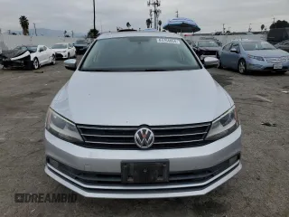 2015 Volkswagen Jetta SE with VIN 3VWD17AJ5FM260475, listed as a Copart auction lot 84764864 with 119,189 mi miles and Salvage title. Bid and sale history available at DreamBid. Image 5.