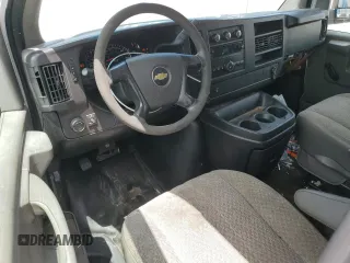 2013 Chevrolet Express Cargo with VIN 1GCWGFBA4D1105381, listed as a Copart auction lot 60138065 with 209,922 mi miles and Salvage title. Bid and sale history available at DreamBid. Image 8.