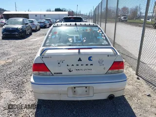 2002 Mitsubishi Lancer OZ-Rally with VIN JA3AJ86E42U039140, listed as a IAAI auction lot 41853888 with 328,181 mi miles. Bid and sale history available at carsss.com. Image 16.