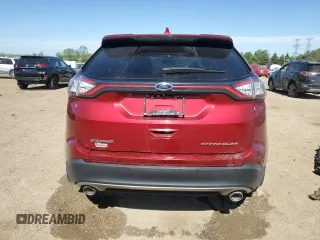 2015 Ford Edge Titanium z VIN 2FMTK3K80FBB76738, wystawiony jako Copart lot #56883875 z przebiegiem 66 197 mil mil oraz Szkoda całkowita • Salvage title. Historia ofert i sprzedaży dostępna na DreamBid. Obrazek 6.