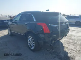 2017 Cadillac XT5 Platinum AWD z VIN 1GYKNFRS7HZ103127, wystawiony jako IAAI lot #41830037 z przebiegiem 82 480 mil mil oraz . Historia ofert i sprzedaży dostępna na DreamBid. Obrazek 3.