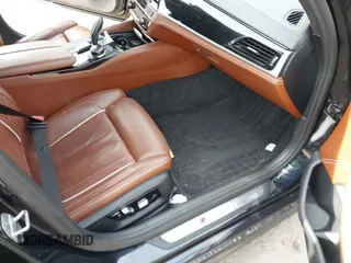2018 BMW 5 Series M550i xDrive with VIN WBAJB9C50JB036400, listed as a IAAI auction lot 41464278 with 139,079 mi miles and . Bid and sale history available at DreamBid. Image 5.