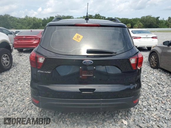2019 Ford Escape S с VIN 1FMCU0F73KUA75241, выставлен на аукционе Copart как лот 58478265 с пробегом 144 259 миль миль и Чистый • Clean title. История ставок и продаж доступна на DreamBid. Изображение 6.