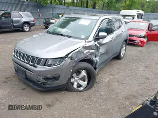 2021 Jeep Compass Latitude with VIN 3C4NJDBBXMT569861, listed as a IAAI auction lot 42325006 with 83,153 mi miles and . Bid and sale history available at DreamBid. Image 2.