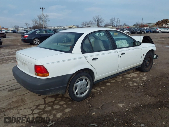 1999 Saturn SL with VIN 1G8ZG5283XZ329617, listed as a IAAI auction lot 41124118 with 195,249 mi miles and . Bid and sale history available at DreamBid. Image 4.