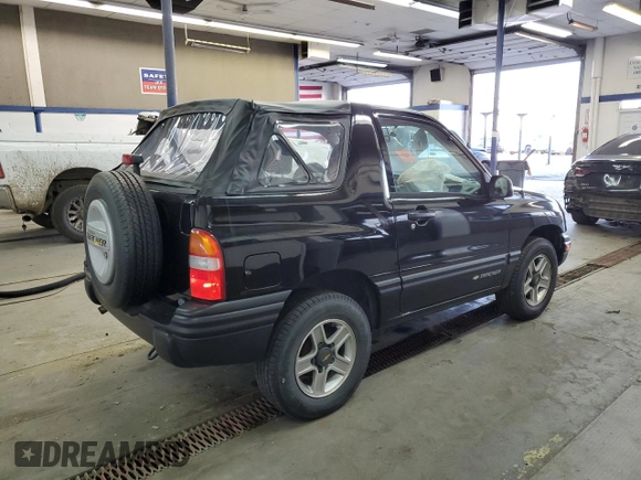 2002 Chevrolet Tracker with VIN 2CNBJ18CX26906088, listed as a Copart auction lot 79519944 with 111,342 mi miles and Salvage title. Bid and sale history available at DreamBid. Image 3.
