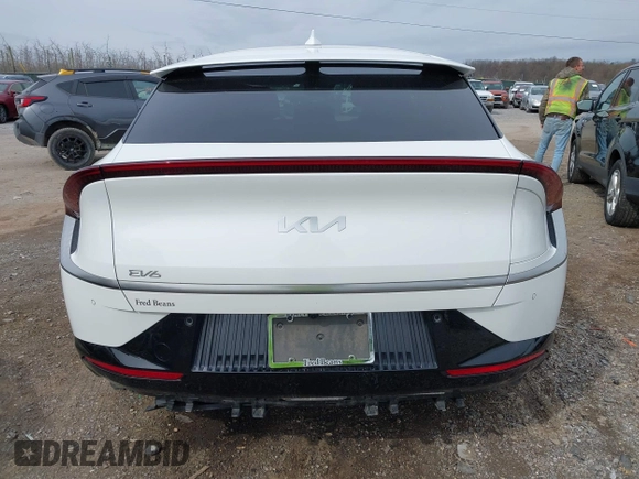 2022 Kia EV6 Wind z VIN KNDC3DLC5N5039405, wystawiony jako IAAI lot #41937250 z przebiegiem 55 659 mil mil oraz . Historia ofert i sprzedaży dostępna na DreamBid. Obrazek 16.
