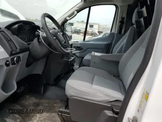 2018 Ford Transit with VIN 1FTYR2YM7JKB11758, listed as a Copart auction lot 56549705 with 104,015 mi miles and Salvage title. Bid and sale history available at DreamBid. Image 7.