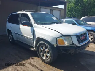 2003 GMC Envoy SLT with VIN 1GKDT13S432190085, listed as a IAAI auction lot 42106915 with 289,933 mi miles. Bid and sale history available at carsss.com. Image 1.