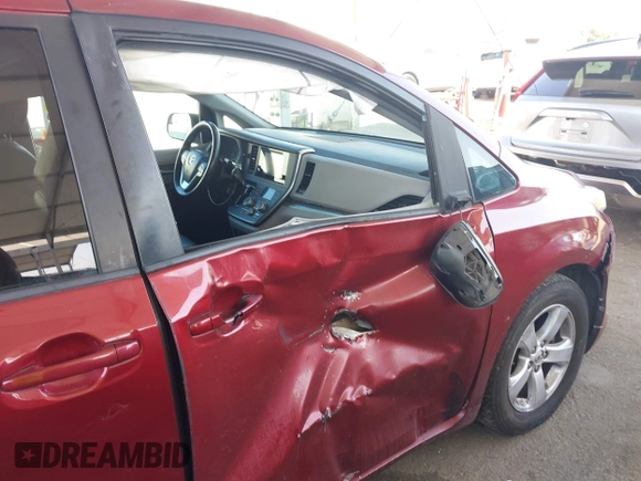 2015 Toyota Sienna LE AAS with VIN 5TDKK3DC7FS563562, listed as a IAAI auction lot 42374720 with 95,040 mi miles and . Bid and sale history available at DreamBid. Image 6.