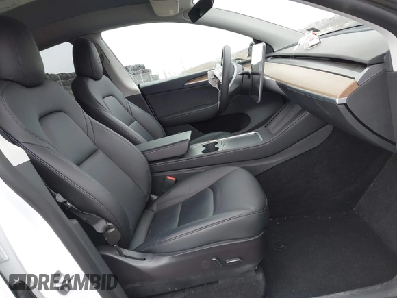 2022 Tesla Model Y Long Range with VIN 7SAYGAEE4NF516625, listed as a IAAI auction lot 41892225 with 33,054 mi miles and . Bid and sale history available at DreamBid. Image 5.
