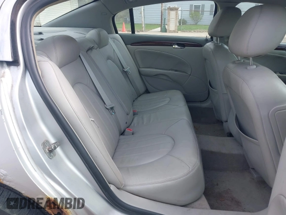 2009 Buick Lucerne CXL with VIN 1G4HD57M79U141033, listed as a IAAI auction lot 42061042 with 161,021 mi miles. Bid and sale history available at carsss.com. Image 8.