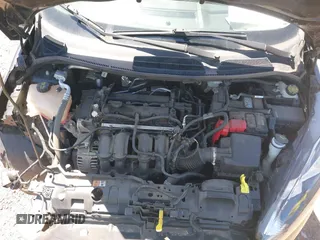 2019 Ford Fiesta SE z VIN 3FADP4EJ0KM125724, wystawiony jako IAAI lot #42320657 z przebiegiem 53 728 mil mil oraz . Historia ofert i sprzedaży dostępna na DreamBid. Obrazek 10.