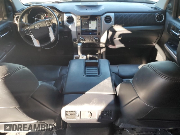 2017 Toyota Tundra Platinum with VIN 5TFAW5F10HX606854, listed as a Copart auction lot 84322634 with 65,668 mi miles and Salvage title. Bid and sale history available at DreamBid. Image 8.