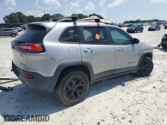 2015 Jeep Cherokee Trailhawk with VIN 1C4PJMBS3FW735398, listed as a Copart auction lot 63700015 with 157,123 mi miles and Clean title. Bid and sale history available at DreamBid. Image 3.