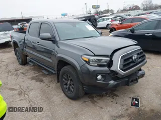2022 Toyota Tacoma SR5 with VIN 3TMBZ5DN5NM035901, listed as a IAAI auction lot 41420177 with 23,504 mi miles and . Bid and sale history available at DreamBid. Image 1.