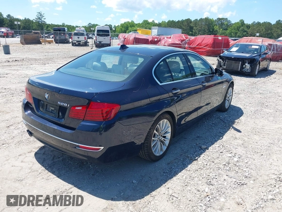 2014 BMW 5 Series 528i z VIN WBA5A5C57ED509930, wystawiony jako IAAI lot #42308771 z przebiegiem 105 286 mil mil oraz . Historia ofert i sprzedaży dostępna na DreamBid. Obrazek 4.