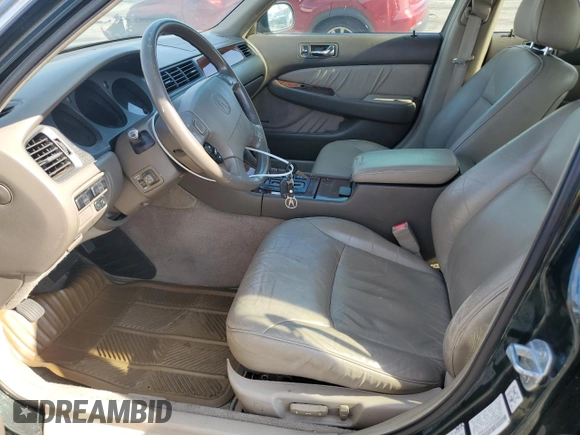 1996 Acura RL with VIN JH4KA965XTC009917, listed as a Copart auction lot 65083665 with 197,486 mi miles and Salvage title. Bid and sale history available at DreamBid. Image 7.