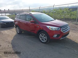 2018 Ford Escape SE z VIN 1FMCU9GD3JUB07869, wystawiony jako IAAI lot #42215842 z przebiegiem 27 184 mil mil oraz . Historia ofert i sprzedaży dostępna na DreamBid. Obrazek 1.