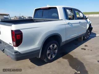 2017 Honda Ridgeline RTL-E with VIN 5FPYK3F7XHB011188, listed as a IAAI auction lot 41766257 with 90,020 mi miles. Bid and sale history available at carsss.com. Image 4.