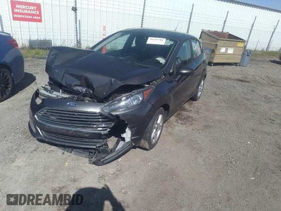 2018 Ford Fiesta SE with VIN 3FADP4EJ0JM141953, listed as a IAAI auction lot 38529613 with 74,502 mi miles and . Bid and sale history available at DreamBid. Image 2.