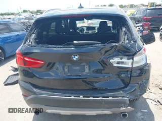 2017 BMW X1 xDrive28i with VIN WBXHT3Z30H4A65417, listed as a IAAI auction lot 42328797 with 103,788 mi miles and . Bid and sale history available at DreamBid. Image 16.