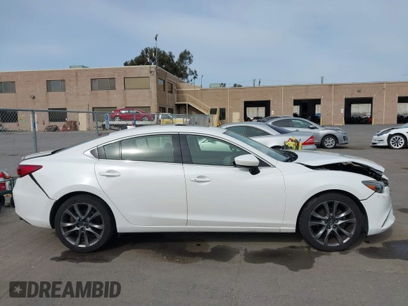 2016 Mazda Mazda6 i Grand Touring with VIN JM1GJ1W51G1444867, listed as a IAAI auction lot 41988597 with 86,844 mi miles. Bid and sale history available at carsss.com. Image 13.