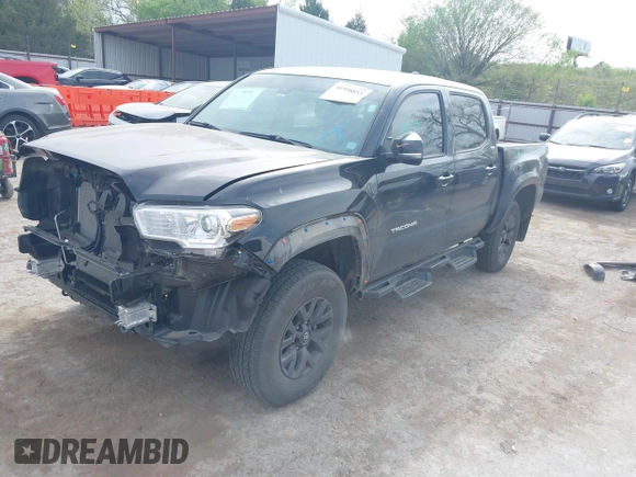 2023 Toyota Tacoma 4WD SR with VIN 3TYCZ5AN4PT170688, listed as a IAAI auction lot 41998053 with 20,770 mi miles. Bid and sale history available at carsss.com. Image 19.
