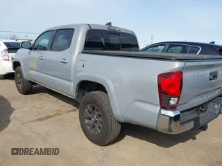 2020 Toyota Tacoma SR5 with VIN 5TFAZ5CN6LX089275, listed as a IAAI auction lot 41987526 with 51,661 mi miles and . Bid and sale history available at DreamBid. Image 3.