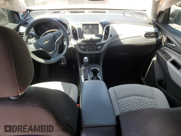 2020 Chevrolet Equinox LS z VIN 2GNAXHEV3L6149833, wystawiony jako Copart lot #57997985 z przebiegiem 64 304 mil mil oraz Szkoda całkowita • Salvage title. Historia ofert i sprzedaży dostępna na DreamBid. Obrazek 8.