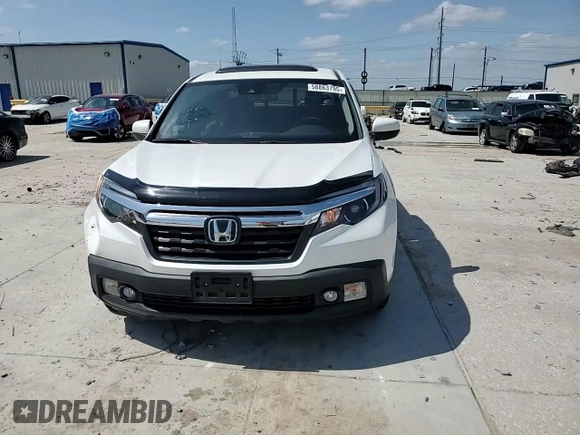 2020 Honda Ridgeline RTL with VIN 5FPYK3F57LB031244, listed as a Copart auction lot 58863795 with 54,318 mi miles and Salvage title. Bid and sale history available at DreamBid. Image 14.