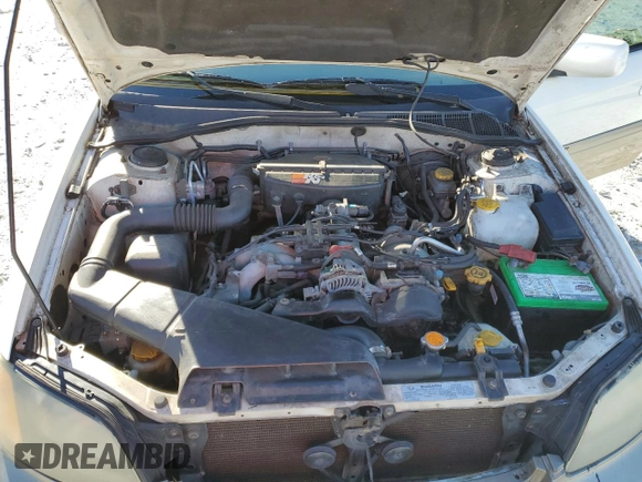 2003 Subaru Legacy Outback Limited z VIN 4S3BH686137610644, wystawiony jako Copart lot #88772325 z przebiegiem 153 022 mil mil oraz Szkoda całkowita • Salvage title. Historia ofert i sprzedaży dostępna na DreamBid. Obrazek 11.