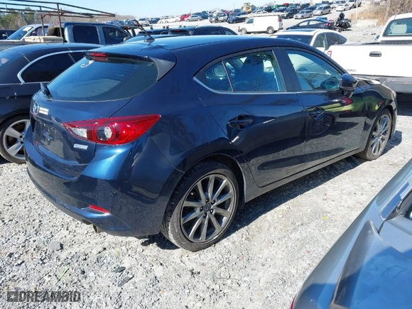 2018 Mazda Mazda3 5-Door Touring with VIN 3MZBN1L36JM265183, listed as a IAAI auction lot 41581779 with 72,410 mi miles. Bid and sale history available at carsss.com. Image 4.