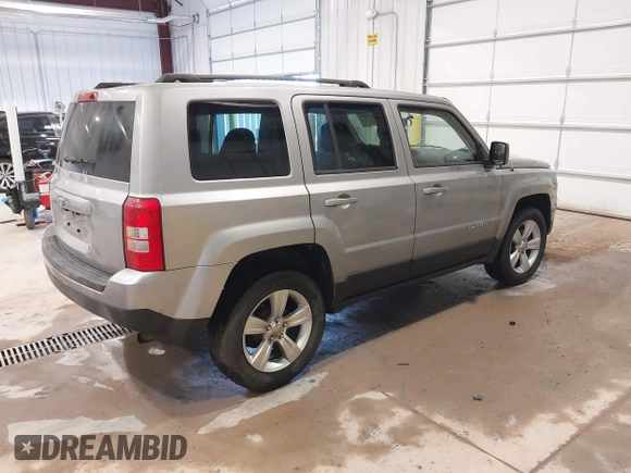 2014 Jeep Patriot Sport with VIN 1C4NJPBB2ED758884, listed as a IAAI auction lot 41290599 with 136,655 mi miles and . Bid and sale history available at DreamBid. Image 4.