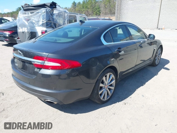 2014 Jaguar XF V6 SC with VIN SAJWJ0EF9E8U31032, listed as a IAAI auction lot 42046036 with 118,927 mi miles. Bid and sale history available at carsss.com. Image 4.