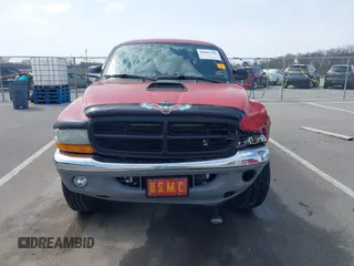 2003 Dodge Dakota z VIN 1D7HG42X93S296117, wystawiony jako IAAI lot #42045149 z przebiegiem 161 725 mil mil oraz . Historia ofert i sprzedaży dostępna na DreamBid. Obrazek 12.