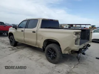 2023 Chevrolet Silverado 1500 LT Trail Boss with VIN 3GCUDFE88PG115832, listed as a Copart auction lot 48761895 with 57,479 mi miles and Salvage Title. Bid and sale history available at DreamBid. Image 2.