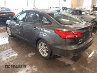 2016 Ford Focus SE with VIN 1FADP3F20GL234077, listed as a IAAI auction lot 41933546 with 106,184 mi miles and . Bid and sale history available at DreamBid. Image 3.