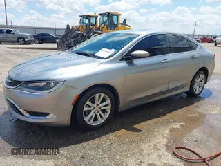 2015 Chrysler 200 Limited with VIN 1C3CCCAB3FN552405, listed as a IAAI auction lot 42153887 with 143,242 mi miles and . Bid and sale history available at DreamBid. Image 2.