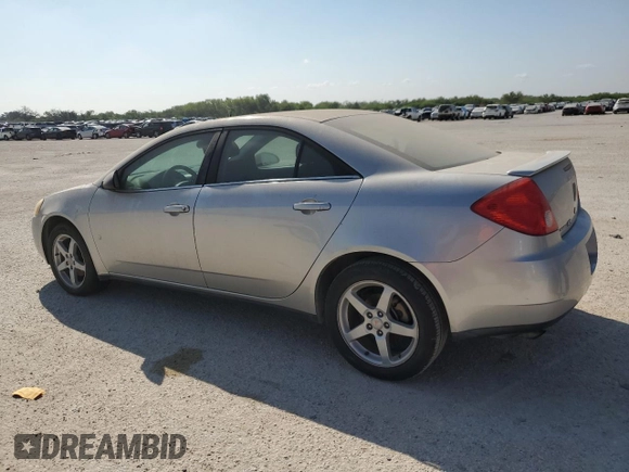2008 Pontiac G6 z VIN 1G2ZG57N184198212, wystawiony jako Copart lot #70977674 z przebiegiem 118 154 mil mil oraz Czysty tytuł • Clean title. Historia ofert i sprzedaży dostępna na DreamBid. Obrazek 2.