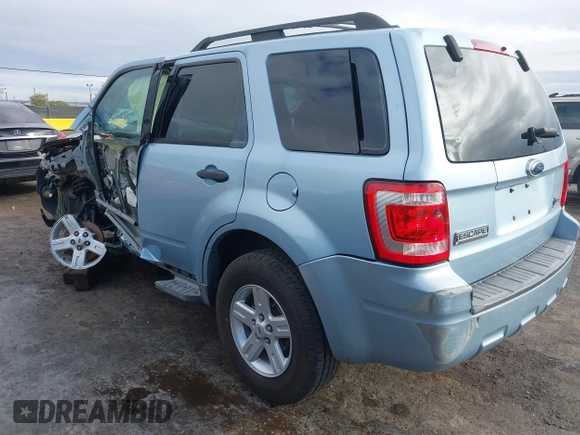 2009 Ford Escape Hybrid with VIN 1FMCU49309KB71172, listed as a IAAI auction lot 40971257 with 118,689 mi miles. Bid and sale history available at carsss.com. Image 3.