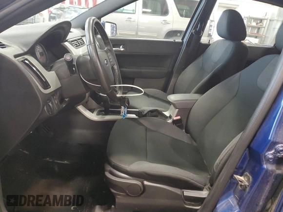 2009 Ford Focus SES with VIN 1FAHP36N79W219797, listed as a Copart auction lot 54210005 with 122,340 mi miles and Non Repairable. Bid and sale history available at carsss.com. Image 7.