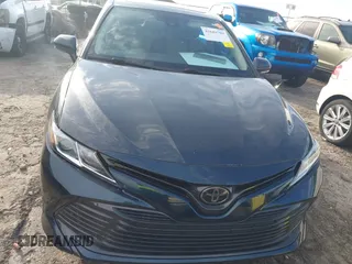 2019 Toyota Camry LE z VIN 4T1B11HK0KU759885, wystawiony jako IAAI lot #41684709 z przebiegiem 80 417 mil mil oraz . Historia ofert i sprzedaży dostępna na DreamBid. Obrazek 12.