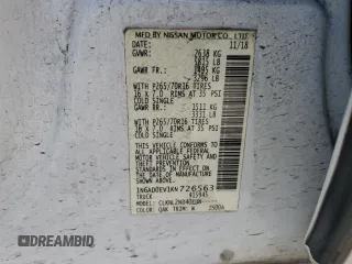 2019 Nissan Frontier Pro-4X with VIN 1N6AD0EV1KN726563, listed as a Copart auction lot 59562995 with 195,113 mi miles and Salvage title. Bid and sale history available at DreamBid. Image 12.