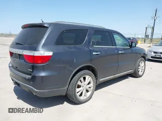 2013 Dodge Durango Crew with VIN 1C4SDHDT5DC637535, listed as a IAAI auction lot 41867982 with 162,569 mi miles and . Bid and sale history available at DreamBid. Image 4.