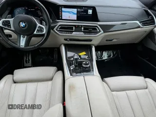 2021 BMW X6 M50i z VIN 5UXCY8C02M9D95172, wystawiony jako Copart lot #84796854 z przebiegiem 75 299 mil mil oraz Czysty tytuł • Clean title. Historia ofert i sprzedaży dostępna na DreamBid. Obrazek 7.