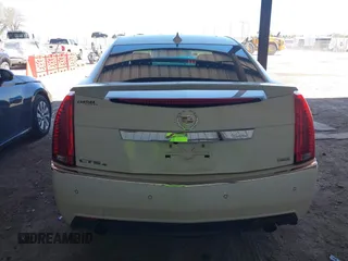 2013 Cadillac CTS Premium z VIN 1G6DS5E30D0105240, wystawiony jako IAAI lot #42145007 z przebiegiem 100 893 mil mil oraz . Historia ofert i sprzedaży dostępna na DreamBid. Obrazek 16.