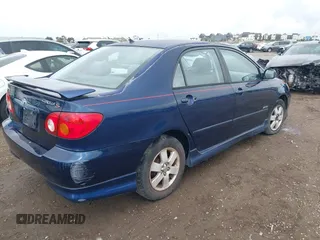 2003 Toyota Corolla CE with VIN 2T1BR32E33C029785, listed as a IAAI auction lot 42147204 with 284,900 mi miles and . Bid and sale history available at DreamBid. Image 4.
